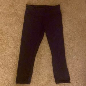 Lululemon capri leggings. Maroon/purple in color. Size 2.